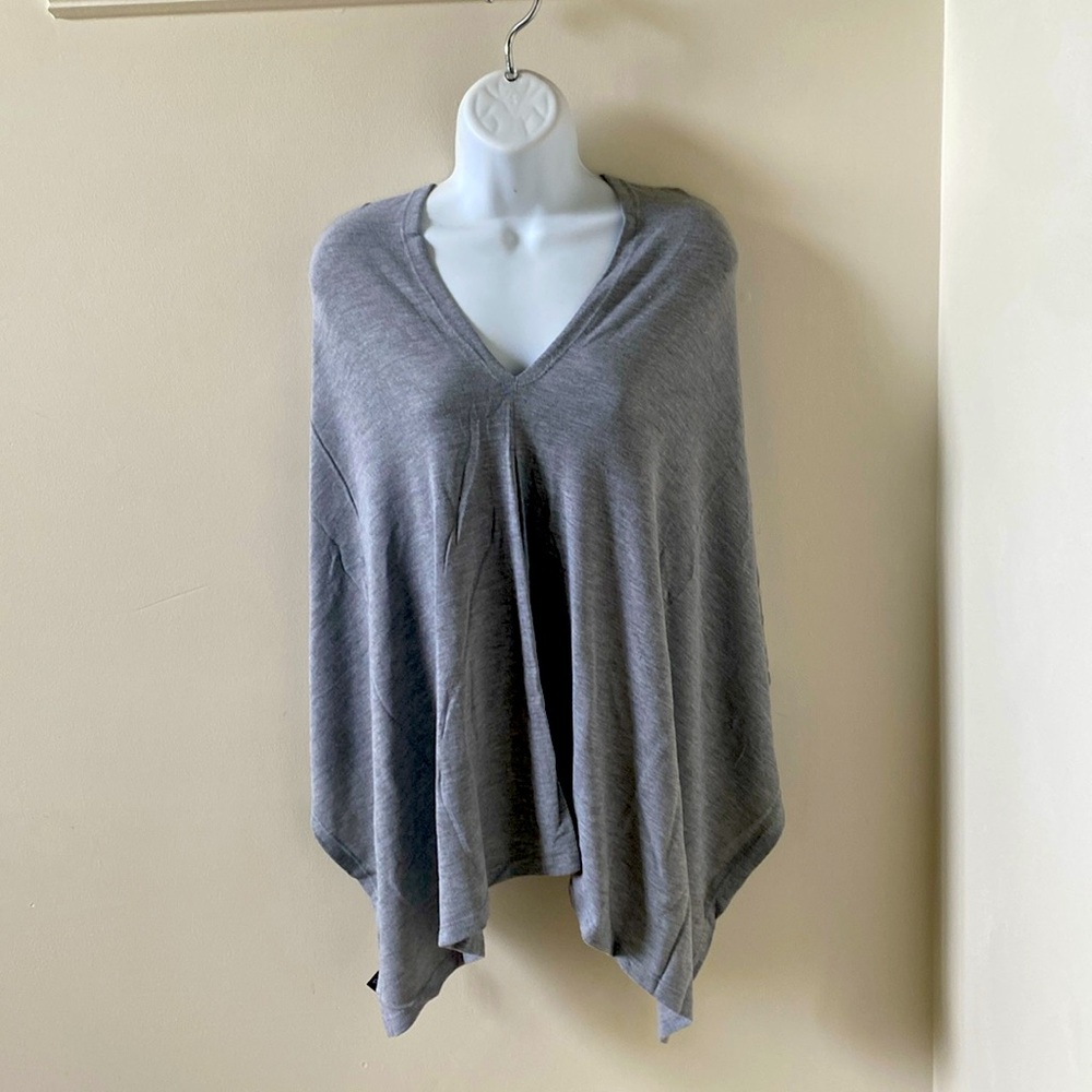 Gray shawl. Sleeveless. New with tags. Polyester.
